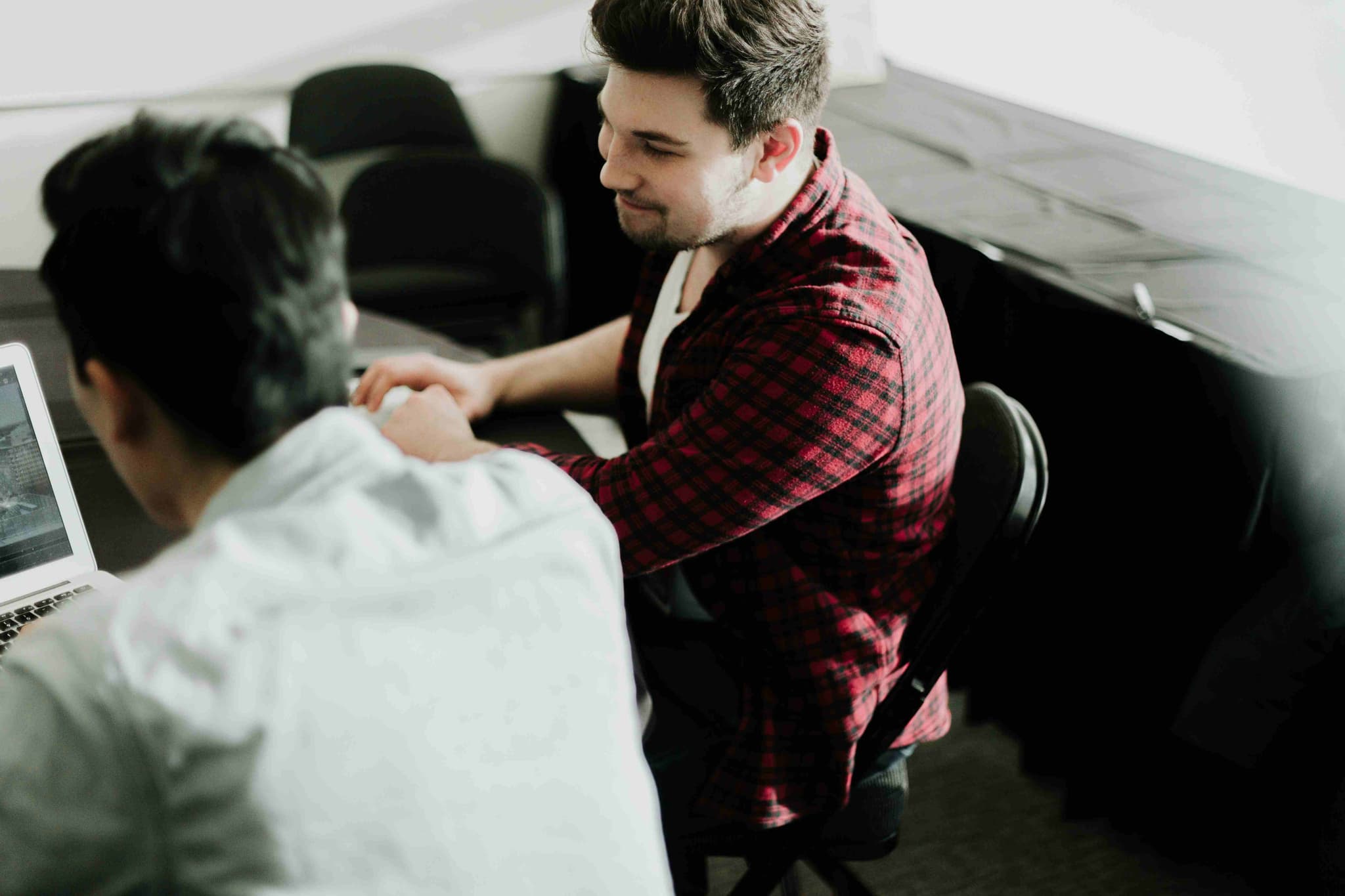 An education advisor going through study options in Malaysia with a student