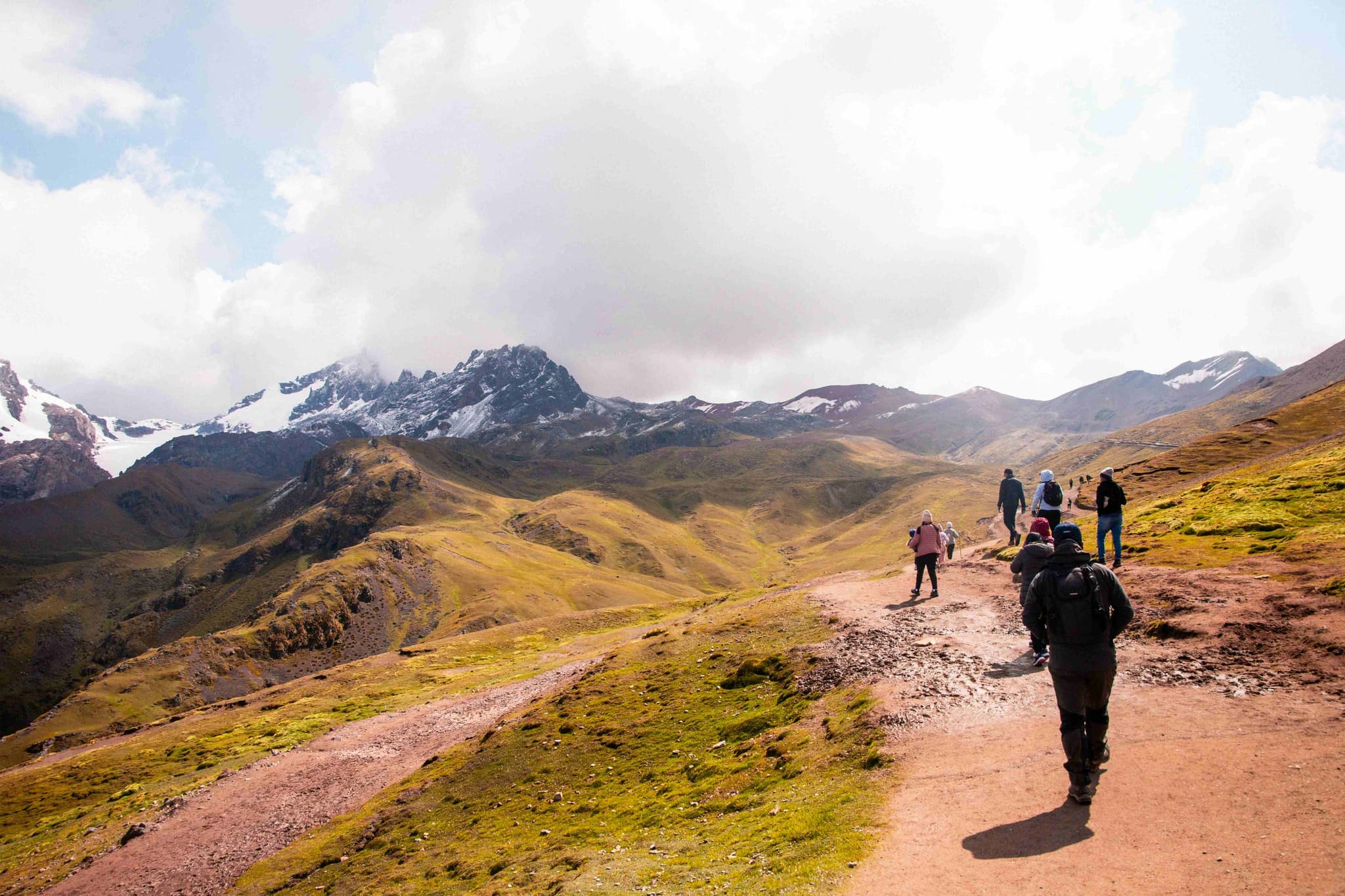 A group of travelers on an organized hiking tour through the hills